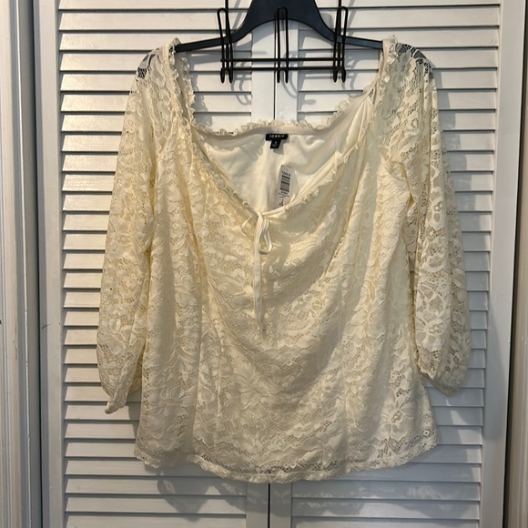 torrid Tops - 3/4 Laced Ivory sleeve from Torrid.